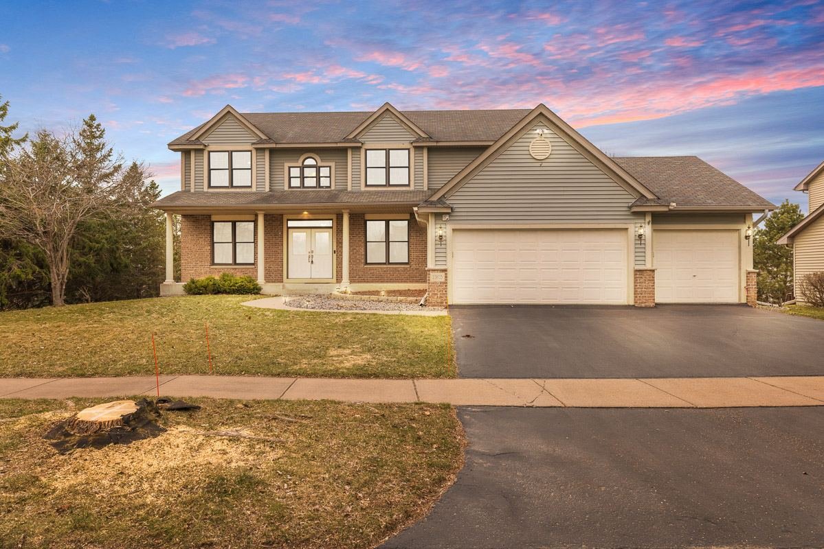 Listing photographed at twilight with drone aerials